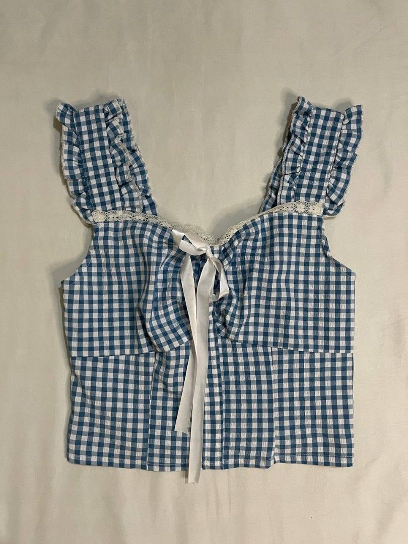 Blue and White Gingham Ruffle Crop Top (Category: Sleeveless) located in Binan City. Submitted by declutterbyjwy (Listing ID 1466446476, Image 1). Description: - can fit xs-s - good as new, used once - Last price posted!.