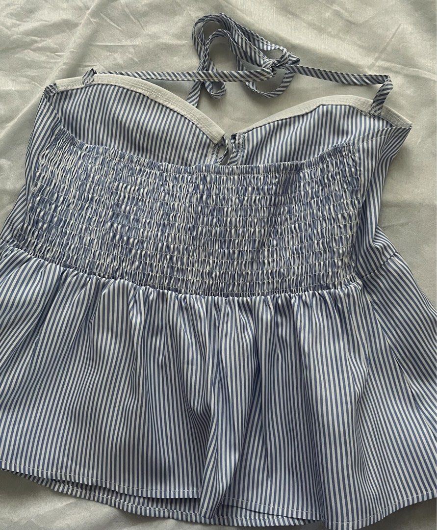 blue and white striped halter top (Category: Sleeveless) located in Manila. Submitted by aurevin (Listing ID 1466362519, Image 2). Description: 📌 size: xs-s 📌 condition: worn once only 📍 Metro Manila 💳 MOP: Gcash / Bank Transfer 📦 MOD: Lalamove / JNT / SDD / GGX / Grab delivery.