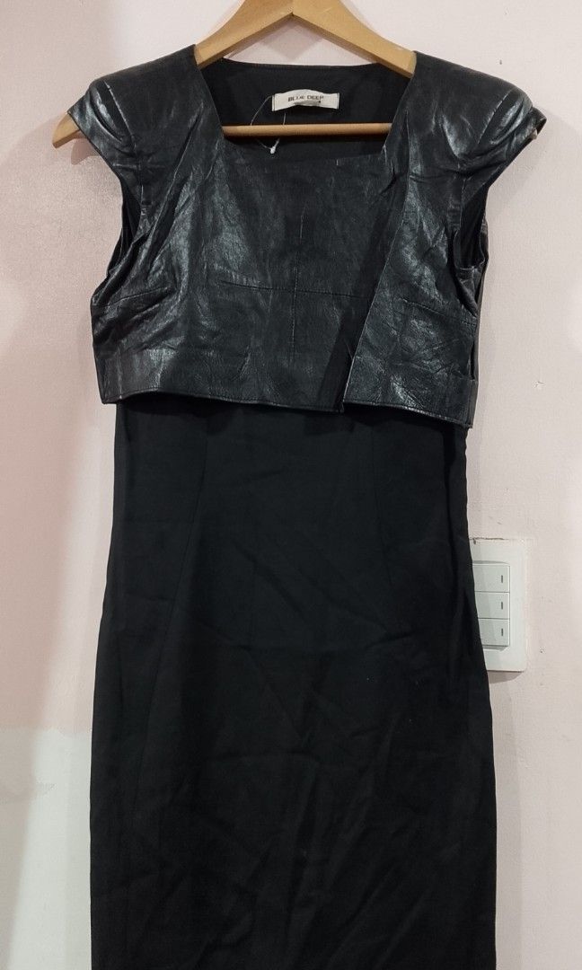 Blue Deep sheath silhouette black dress (Category: Dresses) located in Cabanatuan. Submitted by miss.maia (Listing ID 1466551121, Image 3). Description: This dress features a sheath silhouette combining a structured fabric with a distinctive, high-shine leather or coated-textile overlay panel across the top bodice..