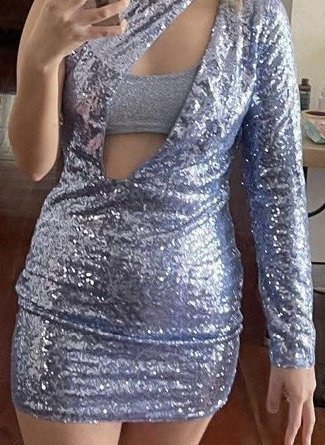 Blue Sequin Mini Dress (Category: Dresses) located in Manila. Submitted by leeminhope (Listing ID 1466480426, Image 2). Description: - Brand: Solado - Color: Blue sequin - Style: Asymmetrical one-shoulder neckline with a single long sleeve - Details: Trendy cutout strap detail, fully lined interior - Condition: Brand new with original tags still attached on the hanger - tried on once only never worn ‼️blue bandeau inside not included ‼️.