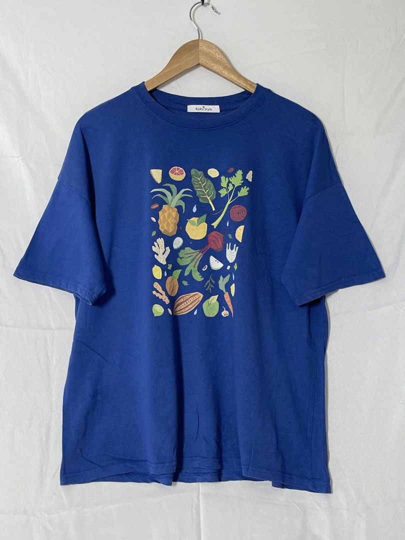 Blue Vegetable Art Graphic Shirt (Category: Tshirts & Polo Shirts ) located in Imus. Submitted by mochi.rella (Listing ID 1466508104, Image 1). Description: Blue Veg Good Condition | Slightly Faded Fit L W 23 | L 26 .