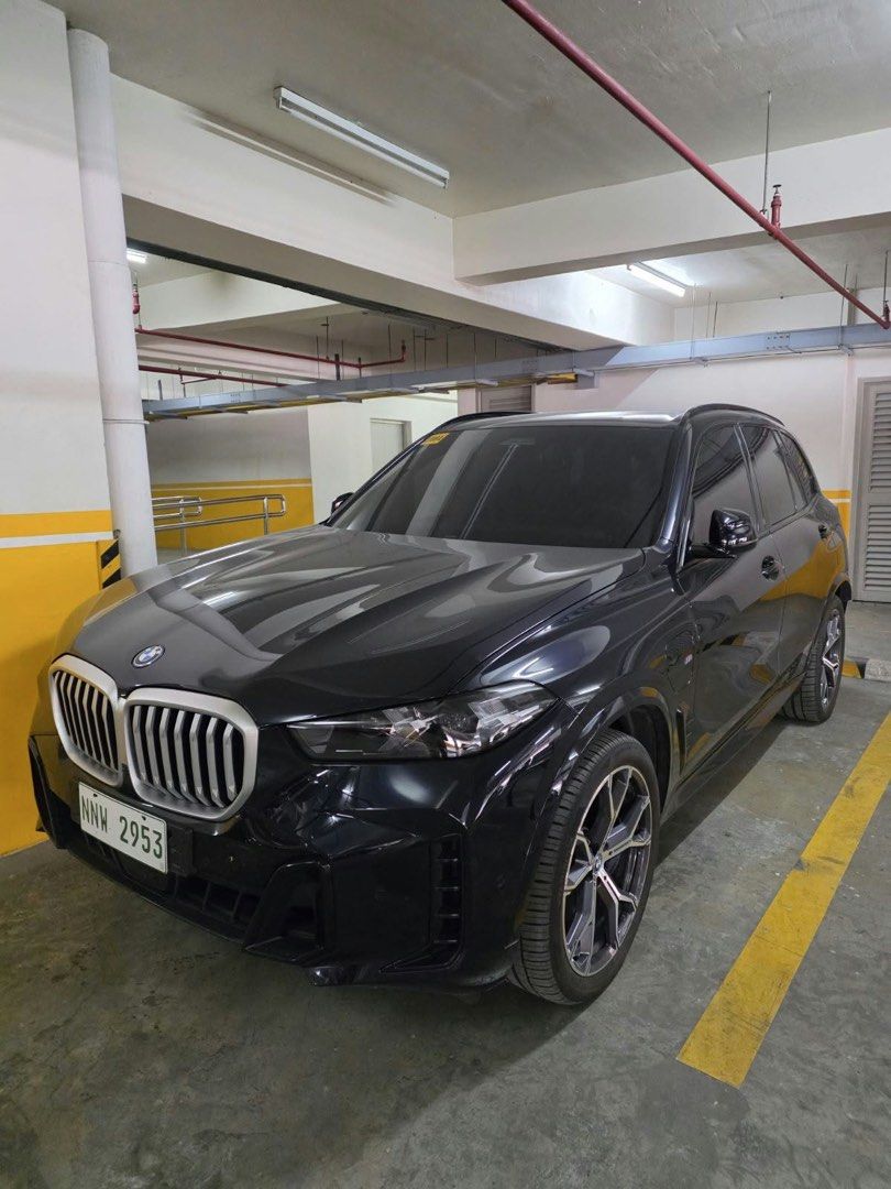 BMW X5 xdrive 50e Auto (Category: New Cars) located in Rizal. Submitted by vinamarie.c (Listing ID 1466411096, Image 2). Description: BMW X5 xDrive50e M Sport | 2025 A refined blend of luxury, performance, and efficiency. Black exterior • 2025 model • M Sport • xDrive AWD • Plug-in Hybrid Only 380 KM mileage Original Price: ₱7.3M Premium Full-Coverage Insurance: ₱7.0M ✨ Selling for only ₱6.7M Exceptionally well-kept and ready for its next owner. 