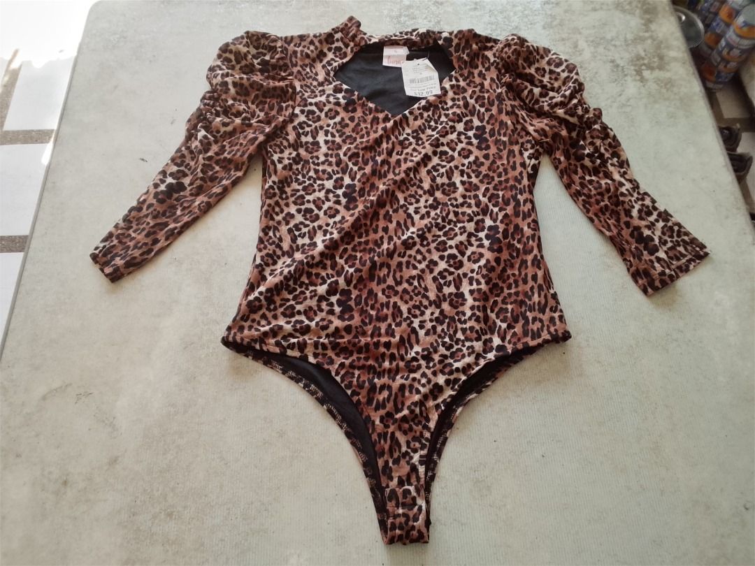 Bodysuit US BNEWTAG (Category: Others Tops) located in Los Banos. Submitted by mania-62906 (Listing ID 1466391786, Image 1). Description: BNEWTAG. US Medium. Animal Print.
