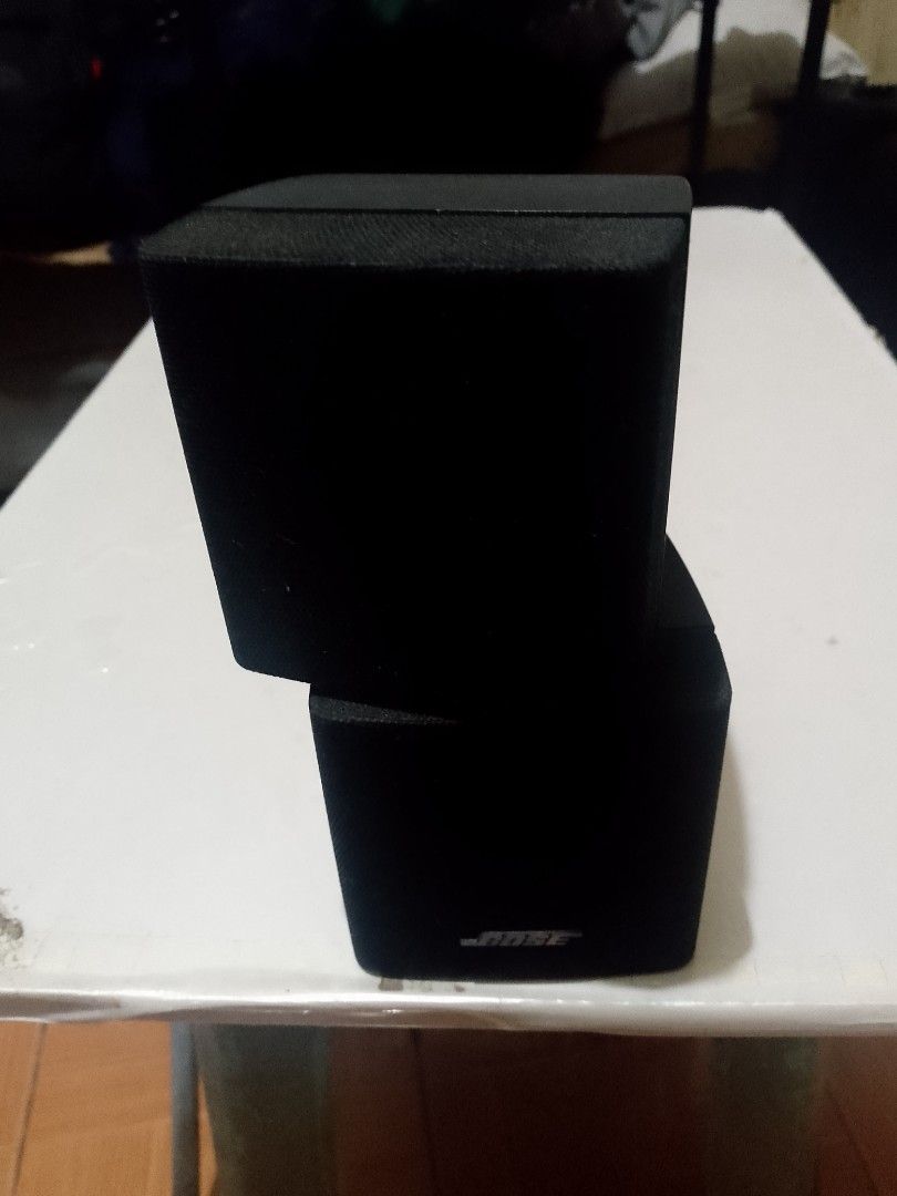 Bose Direct/Reflecting Cube Speaker (Category: Soundbars, Speakers & Amplifiers) located in Manila. Submitted by martinezvp25582 (Listing ID 1466397626, Image 2). Description: - Authentic Black Bose cube speaker with dual pivoting drivers - Direct/reflecting design delivers rich, room-filling audio - Compact bookshelf size, perfect for home theater setups - Stylish fabric grille with silver Bose logo - Features standard rear mounting screw hole a