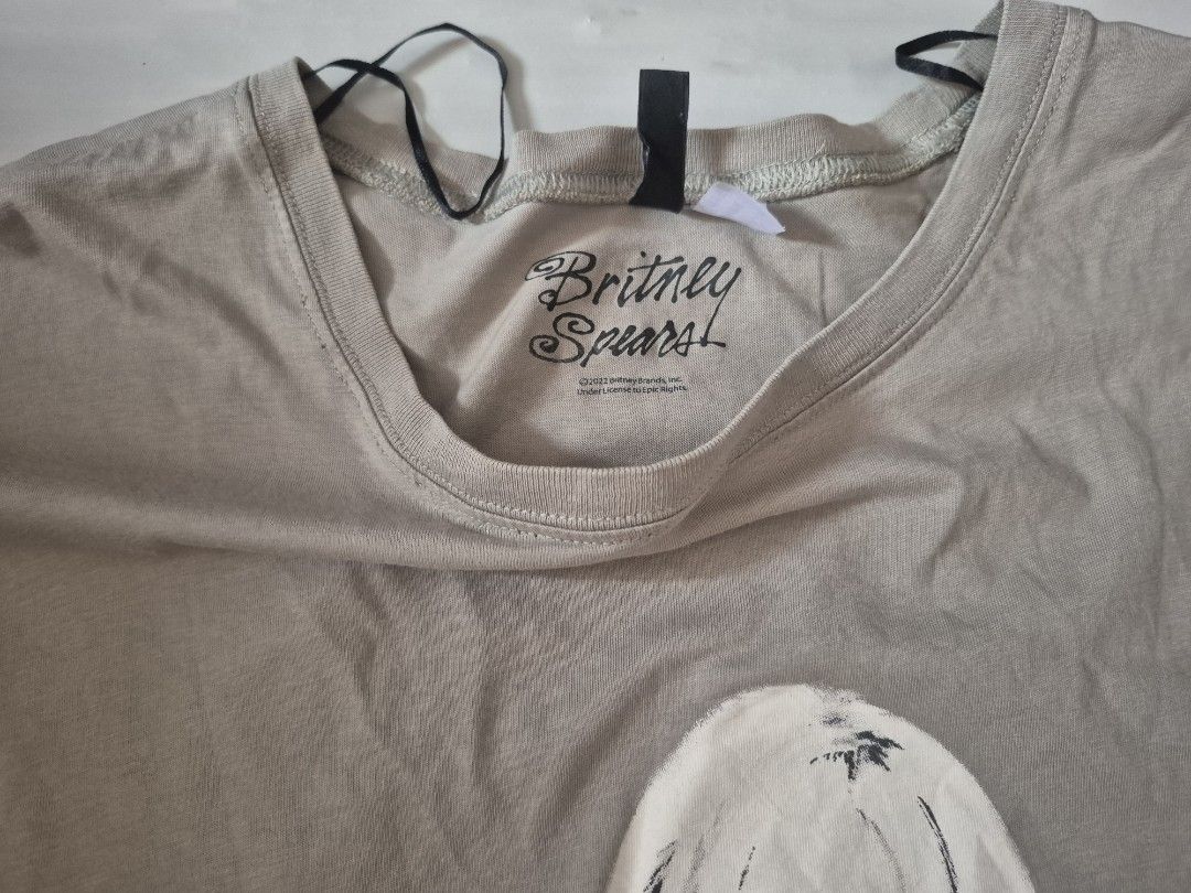 Britney Spears oversized shirt (Category: Shirts) located in Calamba. Submitted by bb.lace (Listing ID 1466261361, Image 2). Description: may almost unnoticeable flaw sa likod, discoloration spot see last 2 pictures.