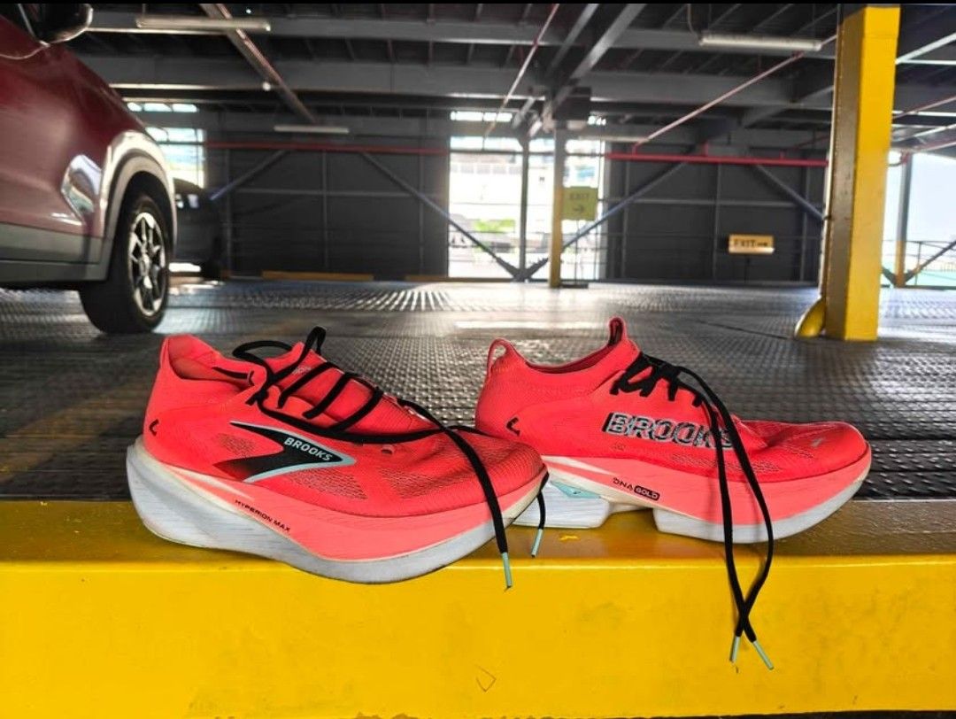 Brooks Hyperion Max Running Shoes Pink Size 10.5 (Category: Sneakers) located in Muntinlupa City. Submitted by hibachionfire (Listing ID 1466431978, Image 2). Description: - Brand: Brooks Hyperion Max - Color: Bright Pink - Size: Men US 10.5 / EUR 44.5 / UK 9.5 - Tech: Thick DNA Gold foam midsole and SpeedVault plates - Condition: Soles show light dirt from brief testing, treads still crisp and deep; uppers are clean with zero fraying - Inclusion