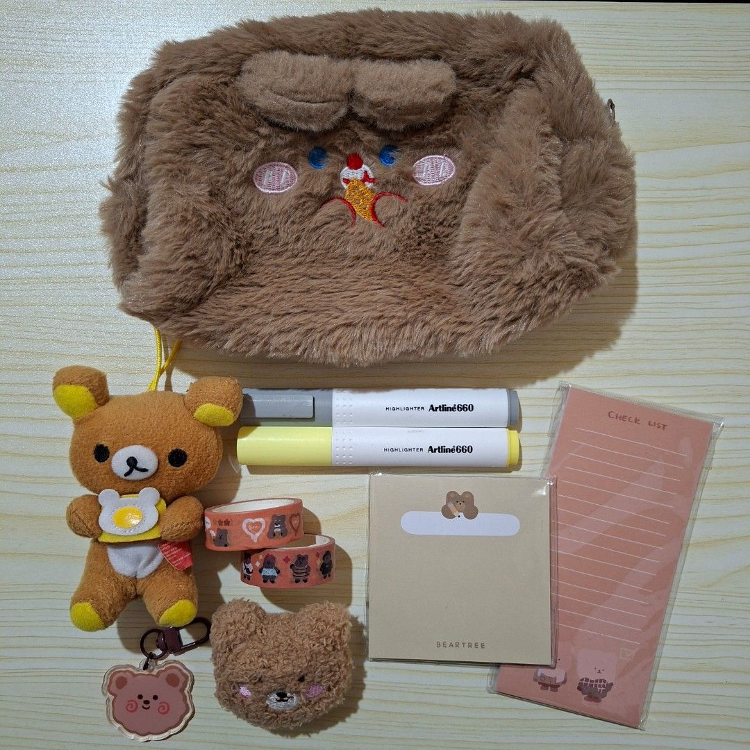 Brown Bear Plush Pouch Stationery Set (Category: Stationery & School Supplies) located in San Manuel. Submitted by loveandgo (Listing ID 1466391286, Image 1). Description: Adorable brown bear stationery and accessories bundle! -Fluffy bear pouch -Rilakkuma plush keychain - 2x bear themed washi tapes -Bear pin -Bear keychain -2x Bear themed notepads -2x Artline highlighters (grey & yellow) - Perfect for school, journaling, or as a gift - Selling a
