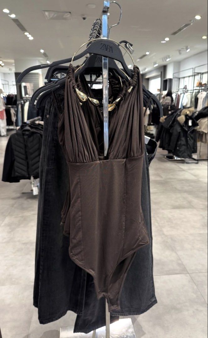 brown halter bodysuit (Category: Sleeveless) located in Taguig. Submitted by shoppiaholic (Listing ID 1466391591, Image 1). Description: .