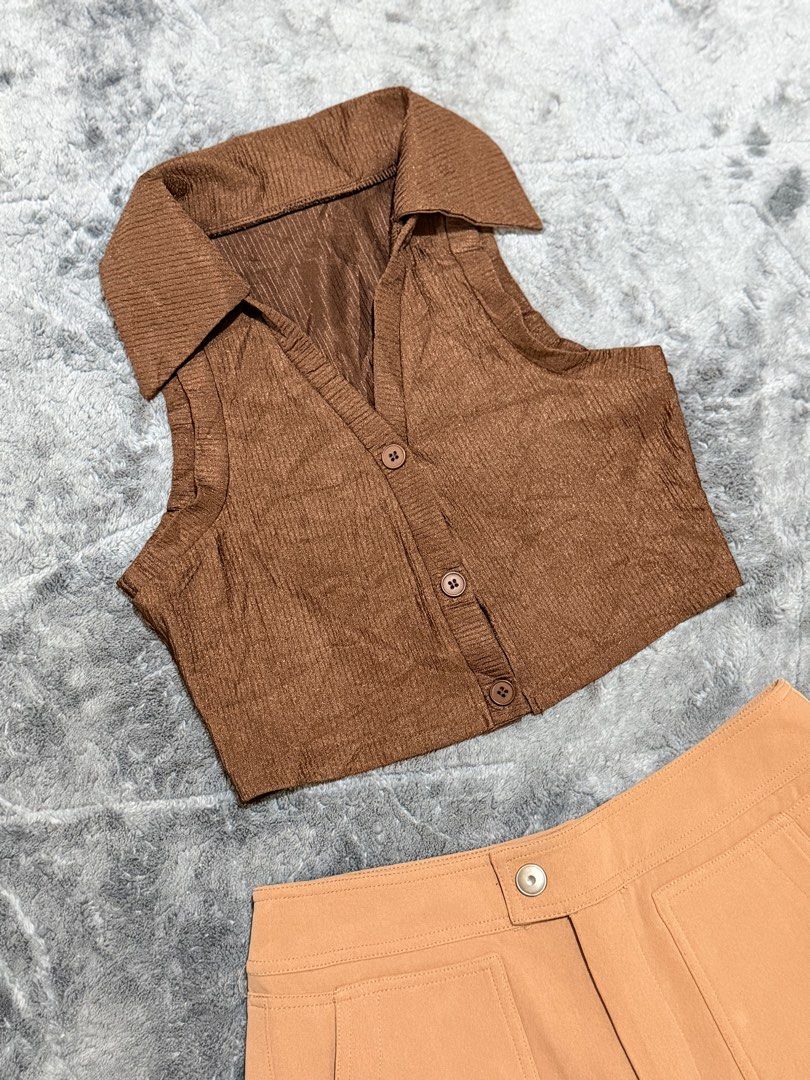 Brown Sleeveless Collared Top and Tan Shorts Set (Category: Sets or Coordinates) located in Manila. Submitted by yeti_it (Listing ID 1466438072, Image 3). Description: - Style: Matching two-piece set in warm earth tones - Top: Brown sleeveless collared top with textured fabric and 3 front buttons - Bottoms: High-waisted tan shorts with large utility front pockets and front button closure - Best for: Casual outings, café hopping, and warm weather 
