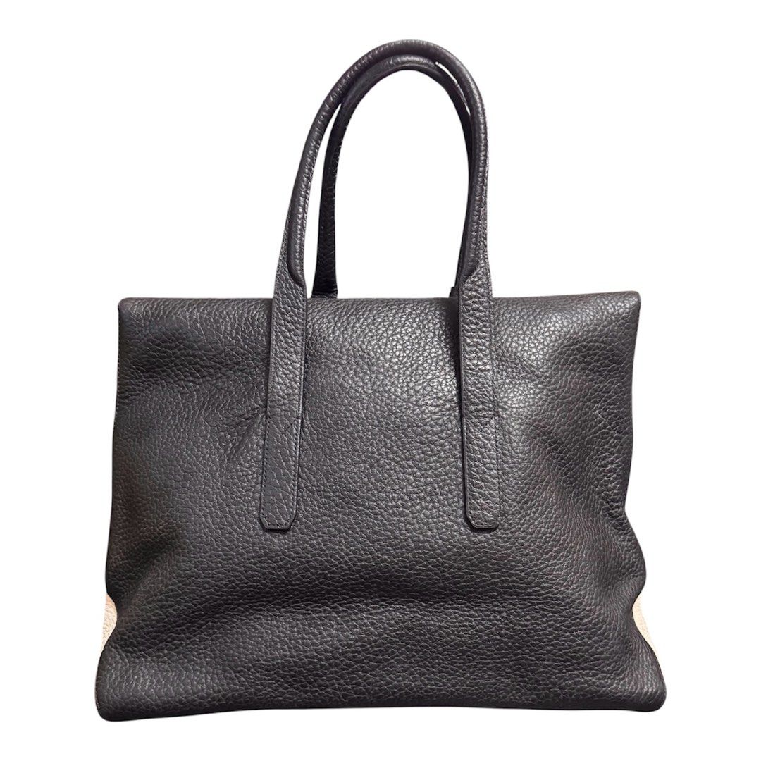 Bruno Magli Grain Leather Tote Bag (Category: Tote Bags) located in Baguio. Submitted by pwz-eshop (Listing ID 1466393327, Image 2). Description: • Up for Grabs!! • Guaranteed Authentic!! • Flaws: Minor rubs on base corners. (please see photos) • BRAND: BRUNO MAGLI. • DIMENSIONS: length 17", height 11.5", width 5.5", handle drop: 6". • SERIAL NUMBER: None. • COUNTRY OF ORIGIN: ITALY. • MATERIAL: Leather. • COLOR: Black and White. • Lining: Canvas