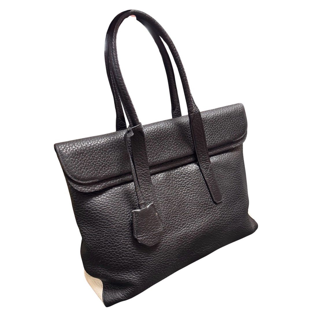 Bruno Magli Grain Leather Tote Bag (Category: Tote Bags) located in Baguio. Submitted by pwz-eshop (Listing ID 1466393327, Image 3). Description: • Up for Grabs!! • Guaranteed Authentic!! • Flaws: Minor rubs on base corners. (please see photos) • BRAND: BRUNO MAGLI. • DIMENSIONS: length 17", height 11.5", width 5.5", handle drop: 6". • SERIAL NUMBER: None. • COUNTRY OF ORIGIN: ITALY. • MATERIAL: Leather. • COLOR: Black and White. • Lining: Canvas