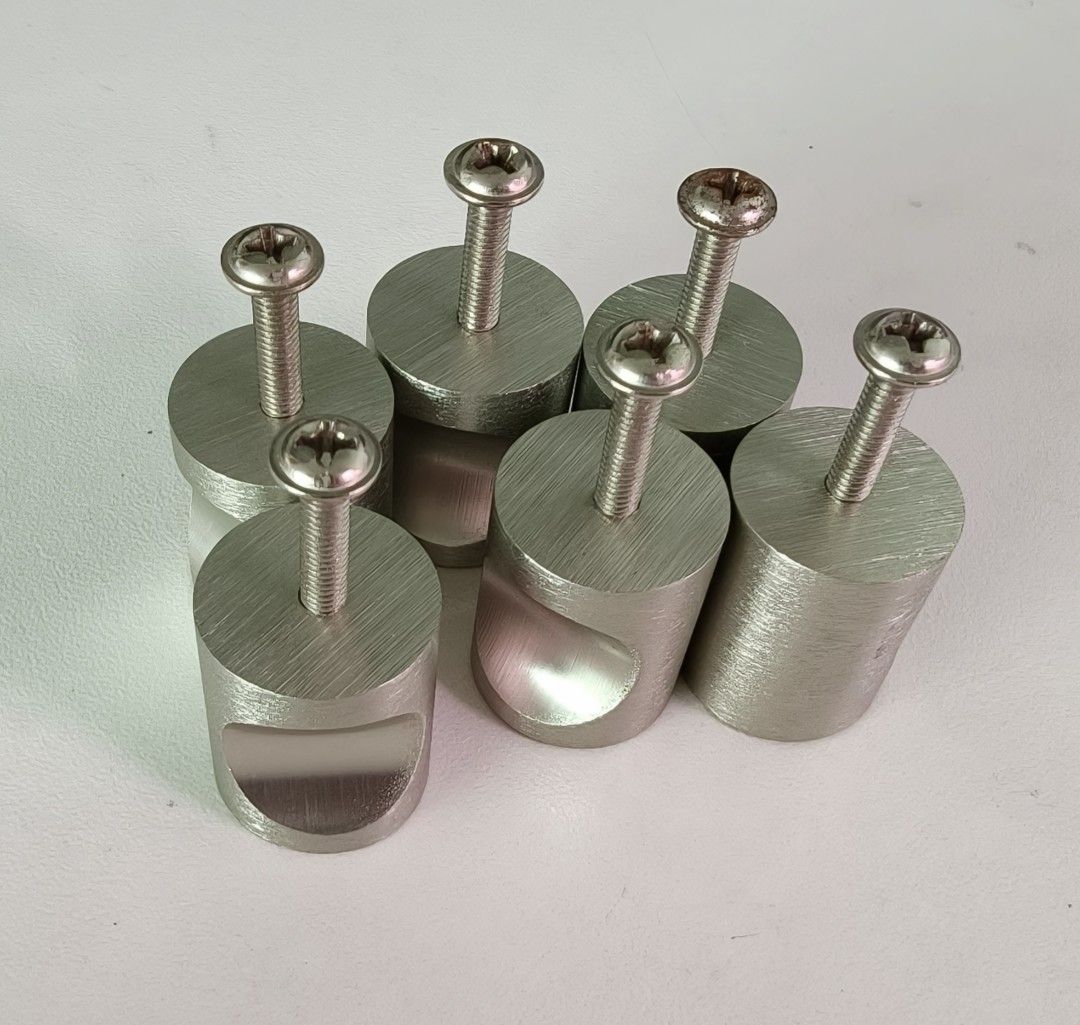 Brushed Nickel Cabinet Knobs (Category: Shelves, Cabinets & Racks) located in Singapore. Submitted by eazy_pz (Listing ID 1466384528, Image 1). Description: - Door knob - Brushed silver metal finish with modern industrial look - Unique scooped front design for a comfortable grip - Solid metal construction with a heavy, premium feel - Suitable for cabinets, drawers, or wardrobe doors - Includes matching mounting screws - Clean overall condition - 