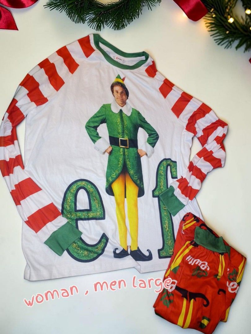 Buddy the Elf Christmas Pajama Set Large (Category: Coats, Jackets and Outerwear) located in Manila. Submitted by crustynico23 (Listing ID 1466522944, Image 1). Description: - Buddy the Elf holiday pajama set - Size: Large (suitable for men or women) - Top: White long-sleeve with classic Will Ferrell graphic and red-and-white striped sleeves - Bottoms: Matching red printed pajama pants - Perfect festive sleepwear for the Christmas season.