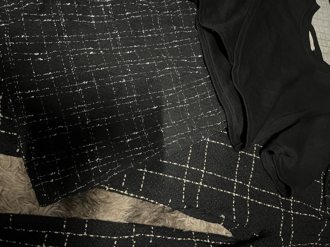 Bundle Black and White Tweed Pants Set with Crop Top (Category: Sets or Coordinates) located in Binan City. Submitted by xo.declutters (Listing ID 1466525298, Image 2). Description: - Matching black and white plaid tweed set - Includes a solid black short-sleeve crop top and patterned trousers - Textured fabric with stylish white grid lines - Versatile outfit for going out or casual days - Easy to mix and match with other wardrobe staples.