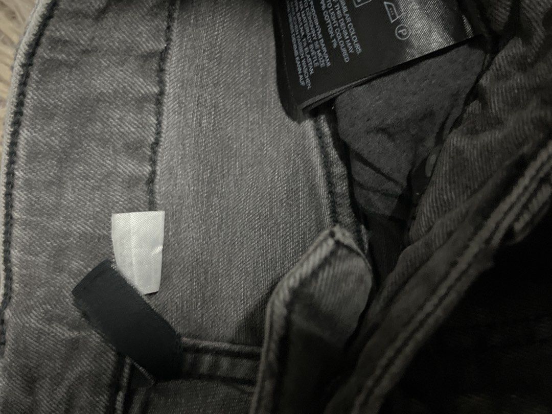 Bundle H&m Grey Denim Jeans Pant with Care Label (Category: Jeans) located in Binan City. Submitted by xo.declutters (Listing ID 1466526036, Image 2). Description: - Color: Solid grey, versatile for casual daily wear - Material: Premium cotton and elastane blend for stretch and comfort - Closure: Classic button fly construction - Details: Reinforced belt loops for extra durability - Care: Standard fabric care instructions on inner tags.
