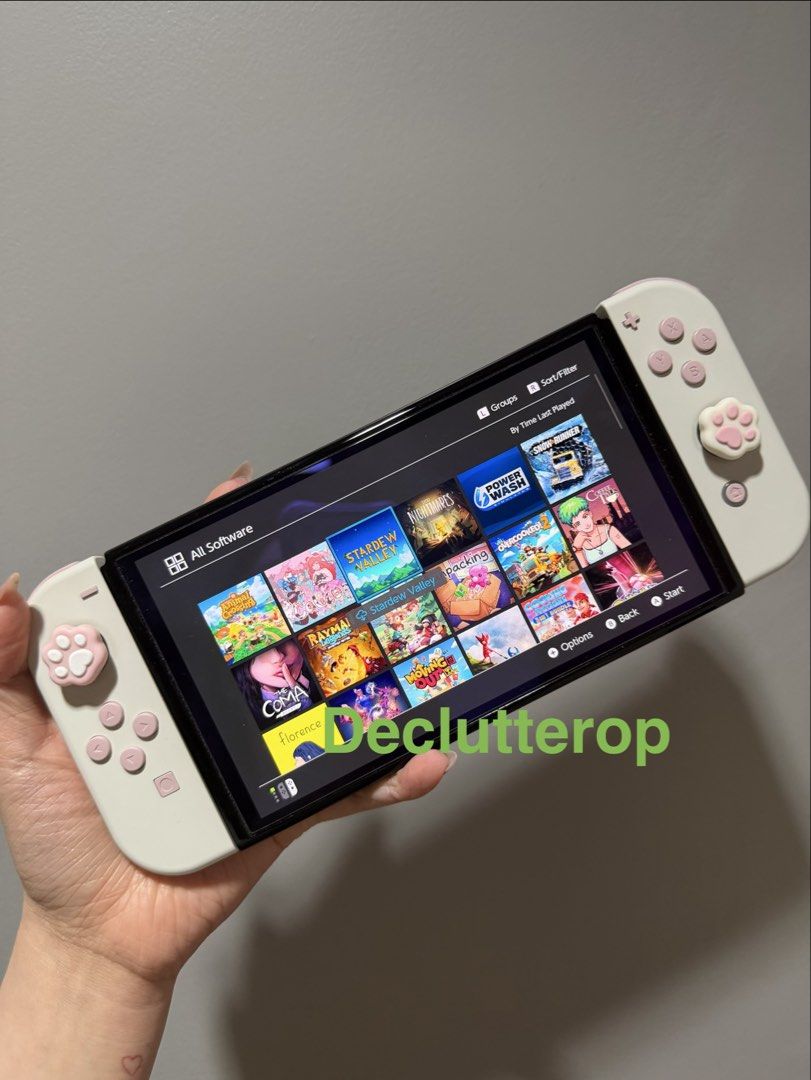 BUNDLE Nintendo Switch OLED Model Bundle with Games and Accessories (Category: Nintendo) located in Quezon City. Submitted by declutterop (Listing ID 1466539364, Image 1). Description: - Nintendo Switch OLED Console (Complete with all standard accessories) - Price: ₱30,000 (Negotiable but please be reasonable) - 11 Physical Game Cartridges (See Pictures) - 37 Purchased Games (see list below. I can give the email or you can transfer ownership to y