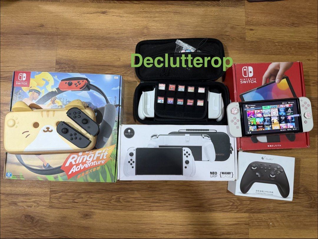 BUNDLE Nintendo Switch OLED Model Bundle with Games and Accessories (Category: Nintendo) located in Quezon City. Submitted by declutterop (Listing ID 1466539364, Image 3). Description: - Nintendo Switch OLED Console (Complete with all standard accessories) - Price: ₱30,000 (Negotiable but please be reasonable) - 11 Physical Game Cartridges (See Pictures) - 37 Purchased Games (see list below. I can give the email or you can transfer ownership to y