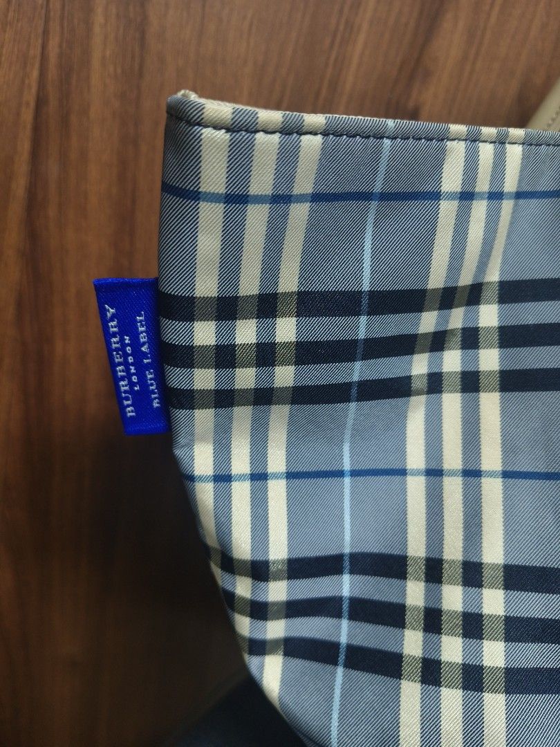 BURBERRY Blue Label Nova Check Tote Bag (Category: Luxury Bags & Wallets) located in Baguio. Submitted by PreiLoveMaria (Listing ID 1466480862, Image 3). Description: BURBERRY Blue Label Nova Check Tote Bag (Blue Colorway) Featuring the iconic blue check pattern and crisp cream leather trim, it's the perfect blend of style and everyday practicality. ​Burberry London Blue Label (Japan Exclusive Line) ​Pattern: Classic Blue Check / Nova Check ​Hard