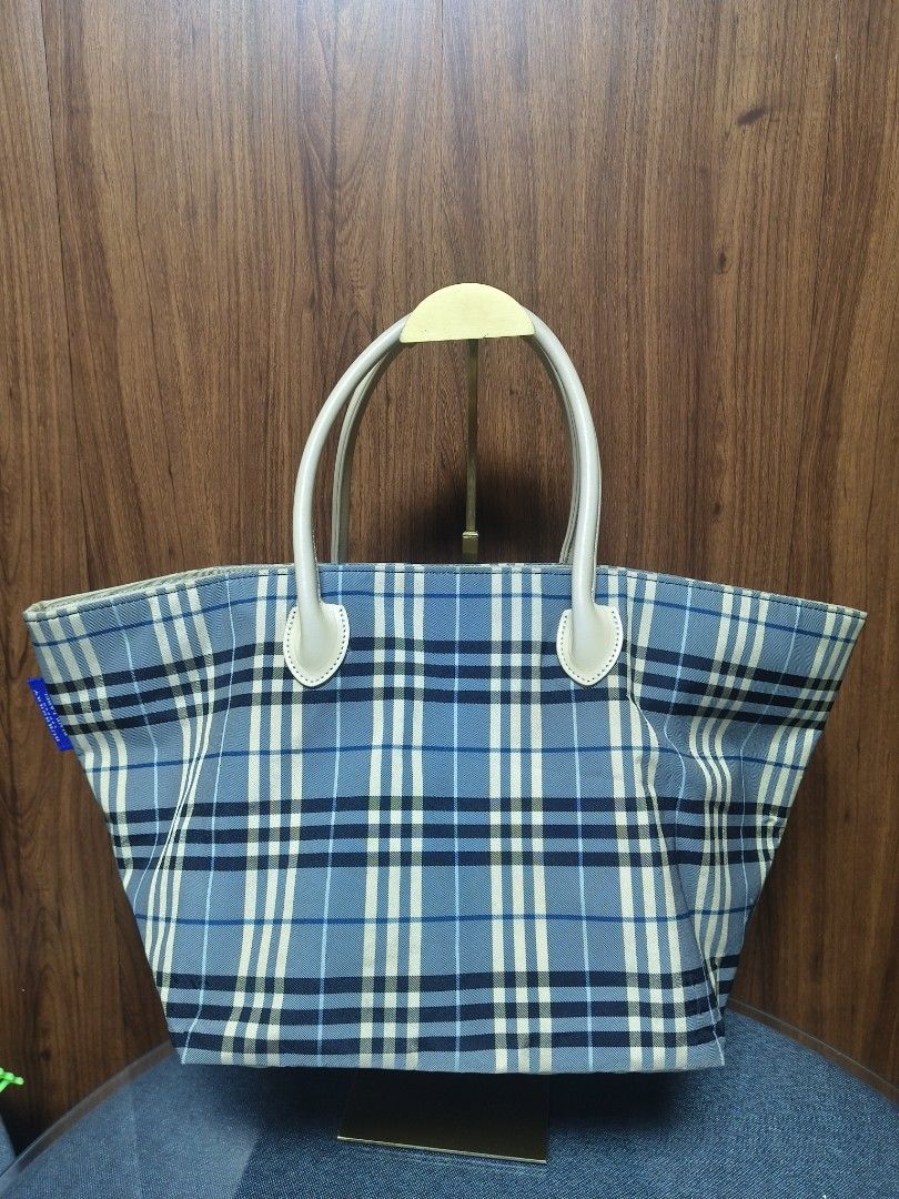 BURBERRY Blue Label Nova Check Tote Bag (Category: Luxury Bags & Wallets) located in Baguio. Submitted by PreiLoveMaria (Listing ID 1466480862, Image 2). Description: BURBERRY Blue Label Nova Check Tote Bag (Blue Colorway) Featuring the iconic blue check pattern and crisp cream leather trim, it's the perfect blend of style and everyday practicality. ​Burberry London Blue Label (Japan Exclusive Line) ​Pattern: Classic Blue Check / Nova Check ​Hard