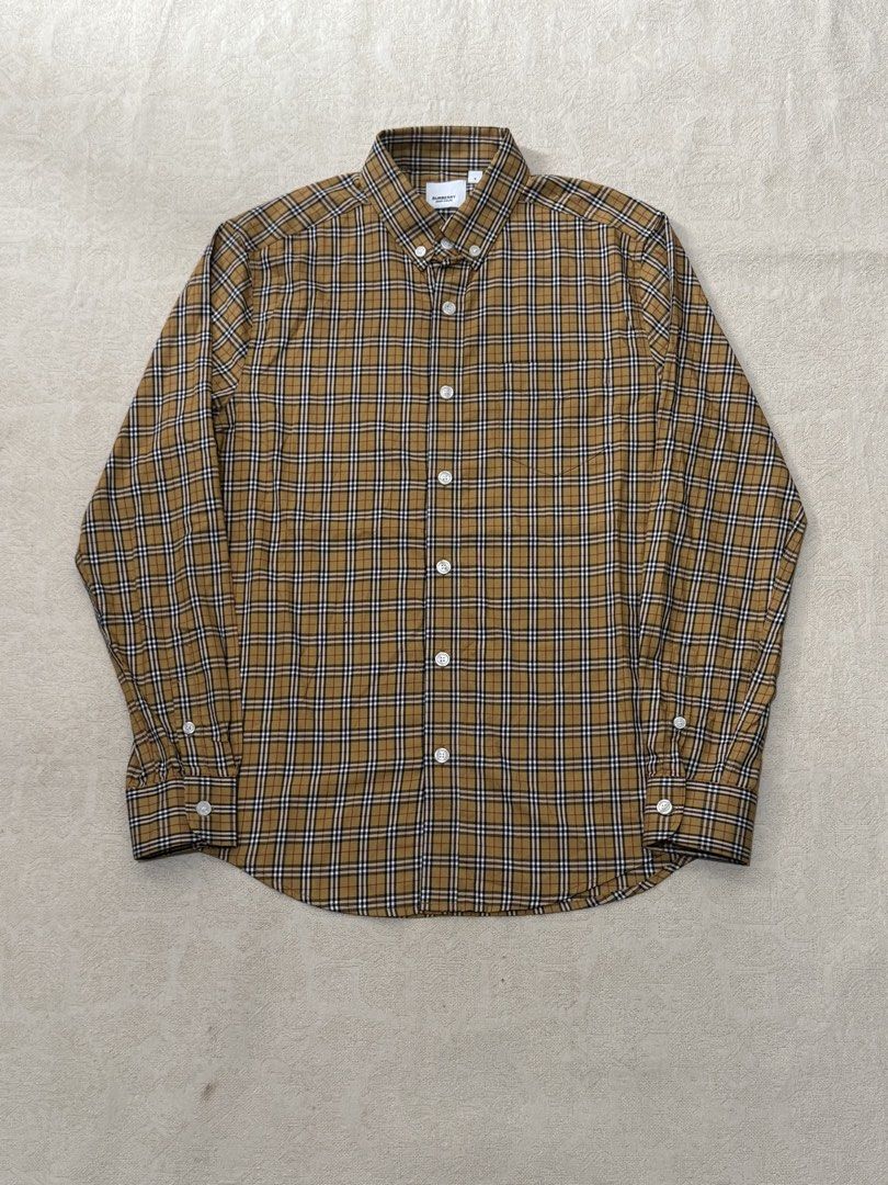 Burberry Nova Plaid Buttondown Longsleeves (Category: Formal Shirts) located in Angeles City. Submitted by luigisells (Listing ID 1466413411, Image 1). Description: Size M 28x19.5 Excellent Condition Issue/s: none MOP: Gcash or Bank Transfer Courier: J&t Express.