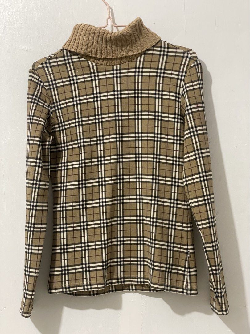 Burberry Vintage Checked Turtle Neck Top (Category: Luxury Apparel) located in Tuguegarao City. Submitted by ziggerryy (Listing ID 1466522839, Image 1). Description: No flaws. No holes Best fits Xs-M.