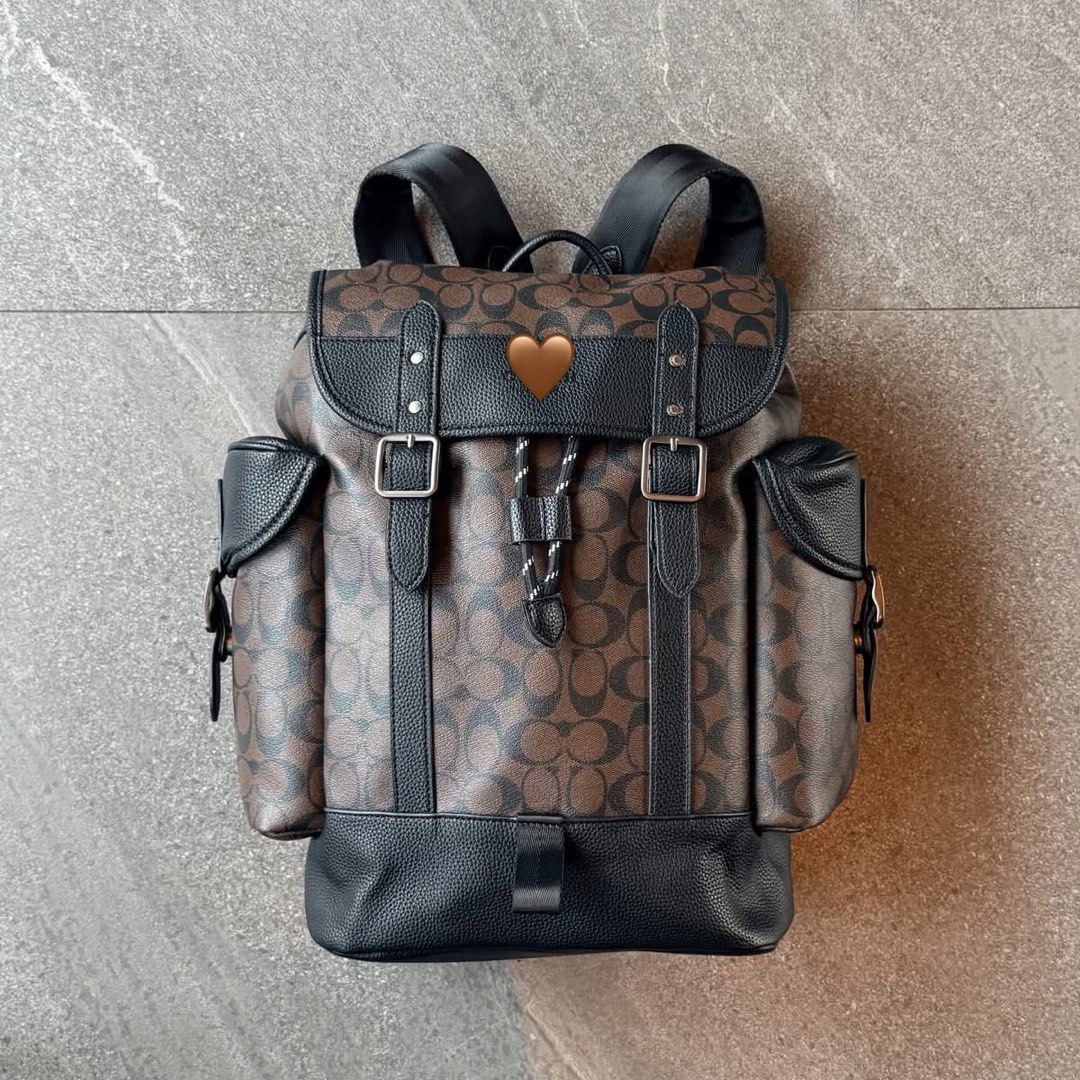 C0@ch Leather Bagpack (Category: Backpacks) located in Manila. Submitted by hatline_co. (Listing ID 1466348990, Image 1). Description: Leather Backpack Wide & Multiple Copartments Double lock Double water bottle pocket Adjustable straps Comes with Dust bag & Paper bag SALE!! .