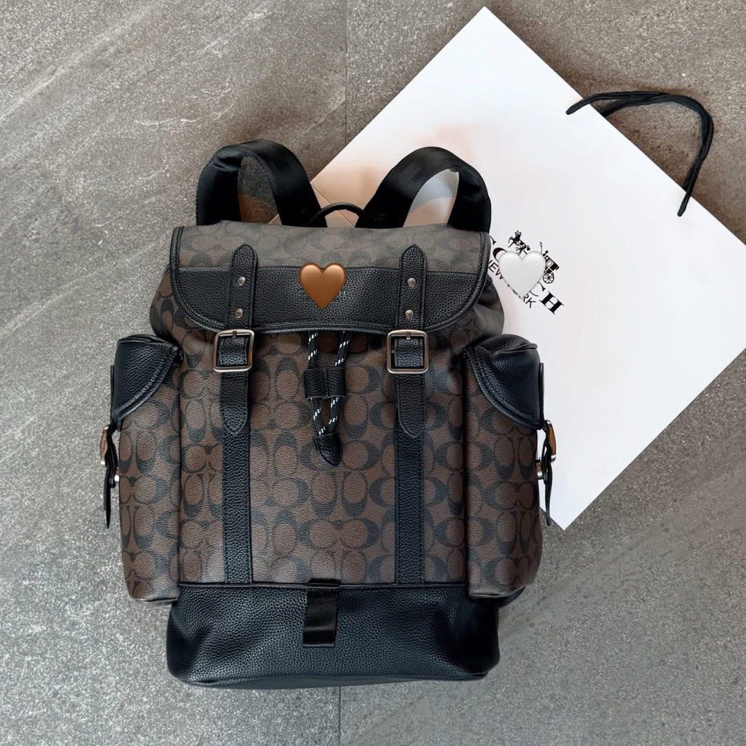 C0@ch Leather Bagpack (Category: Backpacks) located in Manila. Submitted by hatline_co. (Listing ID 1466348990, Image 2). Description: Leather Backpack Wide & Multiple Copartments Double lock Double water bottle pocket Adjustable straps Comes with Dust bag & Paper bag SALE!! .
