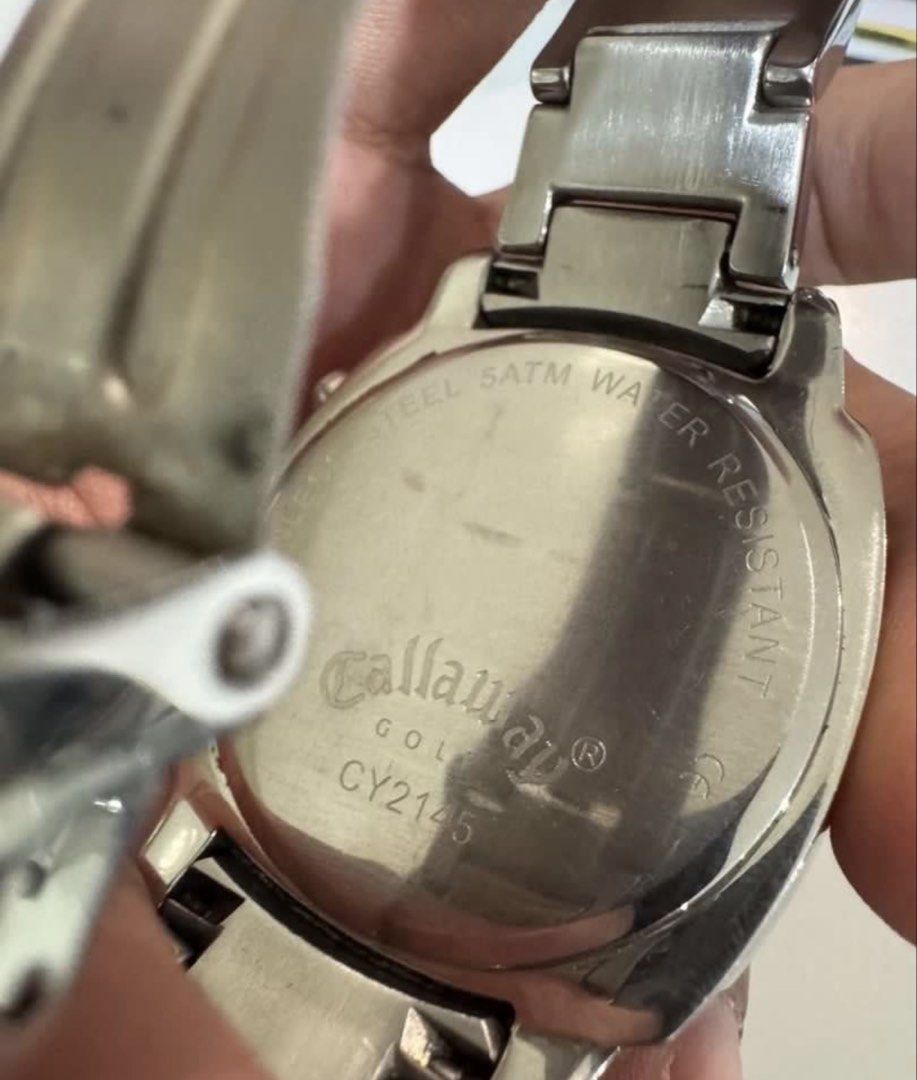 Callaway CY2145 Chronograph Stainless Steel Watch (Category: Men's Watches) located in Laguindingan. Submitted by kixseven (Listing ID 1466428126, Image 2). Description: - Brand/Model: Callaway CY2145 Men's Chronograph Watch - Design: Stainless steel case and metal bracelet with a bold black dial and striking orange numbers - Features: Functional sub-dials and convenient date window at the 3 o'clock position - Durability: 5ATM water resistant rat
