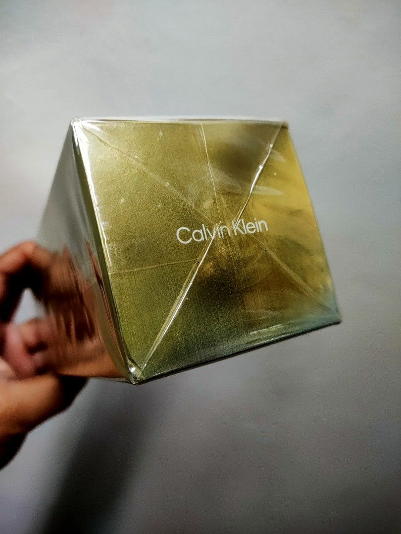 Calvin Klein CK IN2U Her EDT 100ml (Category: Fragrance & Deodorants) located in Bacoor. Submitted by mc_sells17 (Listing ID 1466401049, Image 2). Description: - Authentic Calvin Klein CK IN2U Her Eau de Toilette - Generous 100 ml / 3.4 fl. oz. volume - Brand new and 100% sealed in original plastic wrap - Eye-catching gold box packaging with prominent lettering - Ingredients and batch code printed on the back panel - Expertly manufactured in Spai
