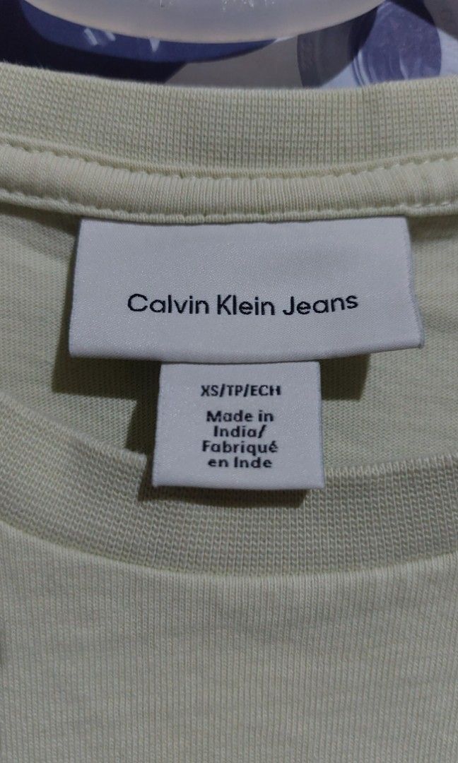 Calvin Klein CK Pistachio Tee (Category: Shirts) located in Manila. Submitted by myelite.otakuworld (Listing ID 1466357468, Image 3). Description: Calvin Klein Brand Tee Pistachio color black and white embossed namebrand in front Size XS.