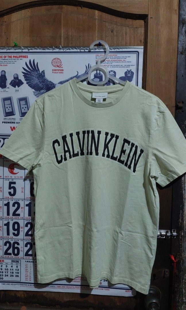 Calvin Klein CK Pistachio Tee (Category: Shirts) located in Manila. Submitted by myelite.otakuworld (Listing ID 1466357468, Image 1). Description: Calvin Klein Brand Tee Pistachio color black and white embossed namebrand in front Size XS.