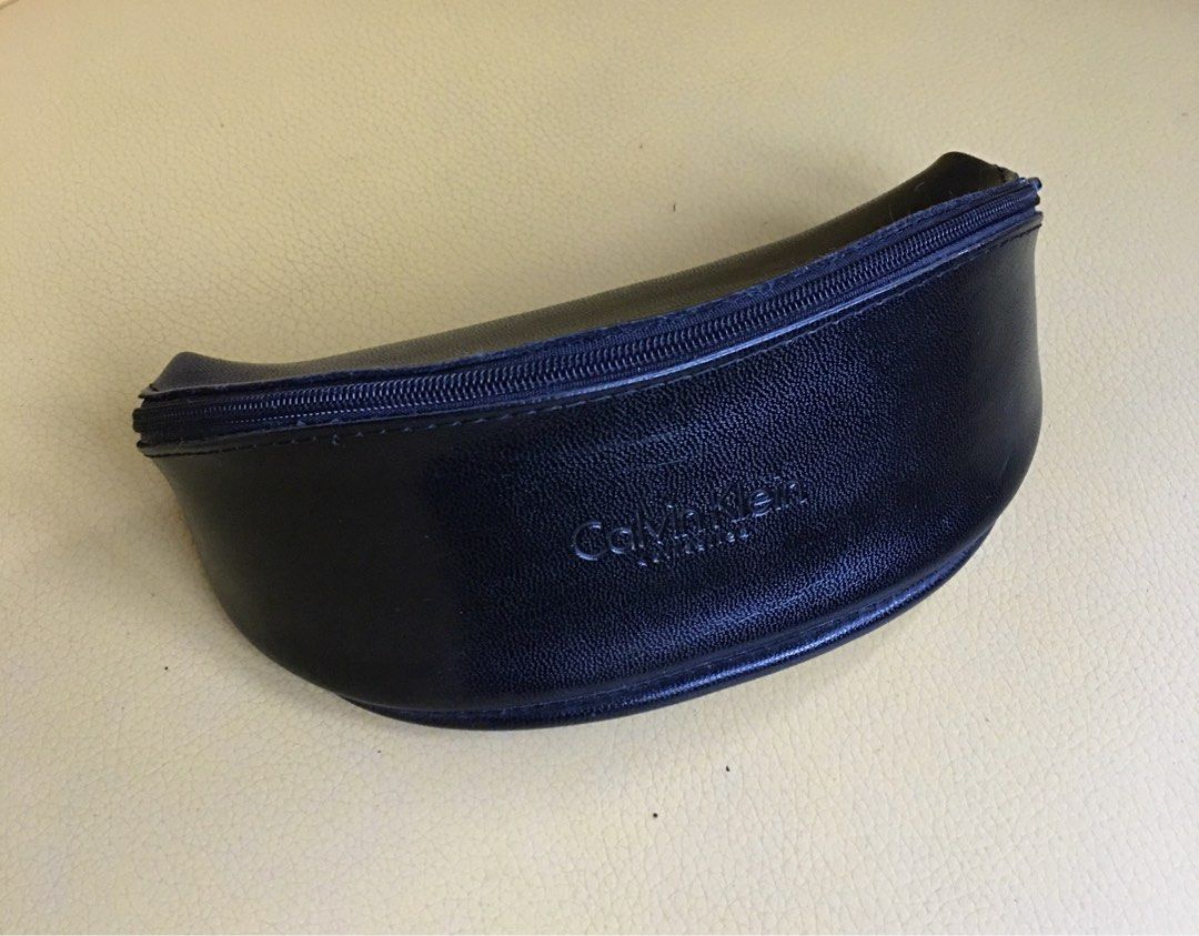 Calvin Klein Collection Zippered Sunglasses Case (Category: Everything Else Others) located in Tarlac. Submitted by greatfindstrlc (Listing ID 1466446732, Image 1). Description: Black soft leather, well used condition. Rare to find..
