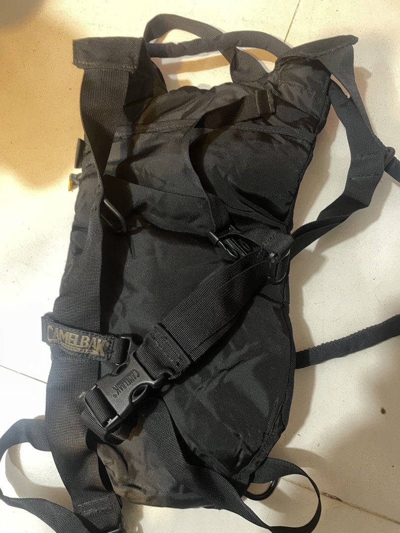 CamelBak Maximum Gear Black Hydration Backpack (Category: Backpacks) located in Manila. Submitted by clementdav22513 (Listing ID 1466363035, Image 2). Description: - Authentic Black CamelBak Maximum Gear hydration pack - Includes comfortable shoulder straps, sternum strap, and drink tube with bite valve - Top fill cap with secure tether to prevent loss - Made with ultra-durable fabric construction throughout - Ideal for hiking, running, cycling, 