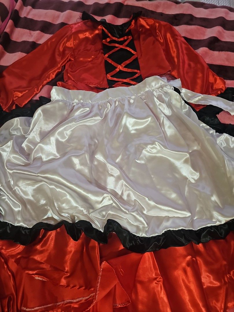 Canada Costume (Category: Babies & Kids Fashion) located in Cainta. Submitted by cyjozuza (Listing ID 1466347723, Image 2). Description: - Vibrant red and black satin dress featuring long sleeves and an eye-catching lace-up bodice - Comes with a glossy white ruffled apron trimmed in black for an authentic look - Made from shiny, high-quality fabric with bright, stunning colors - Equipped with standard tie straps for a comfortable and adjustable f