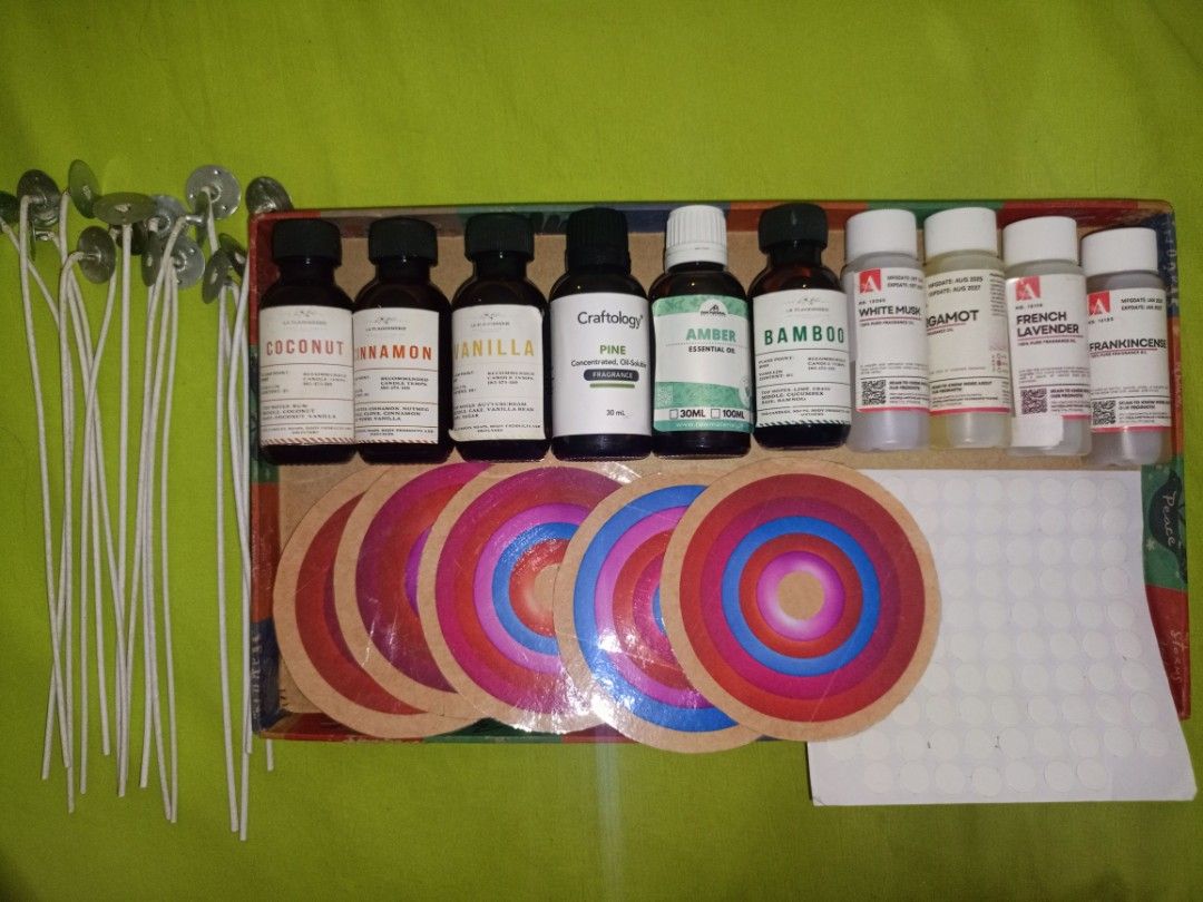 Candle making essentials (90-95%full!) (Category: Home Fragrance) located in Quezon City. Submitted by fibsy (Listing ID 1466486142, Image 1). Description: DIY scented candle making essentials 30 ml bottle (90 to 95% full) 2027 pa expiration 1. Coconut 2. Vanilla 3. Cinnamon 4. Pine 5. Bamboo 6. White Musk 7. French Lavender 8. Bergamot 9. Frankincense 10. Amber (Essential Oil) iba pang kasama: 1. wick sticker (97 pcs.) 2. wick (15 pcs.) 3. pang 