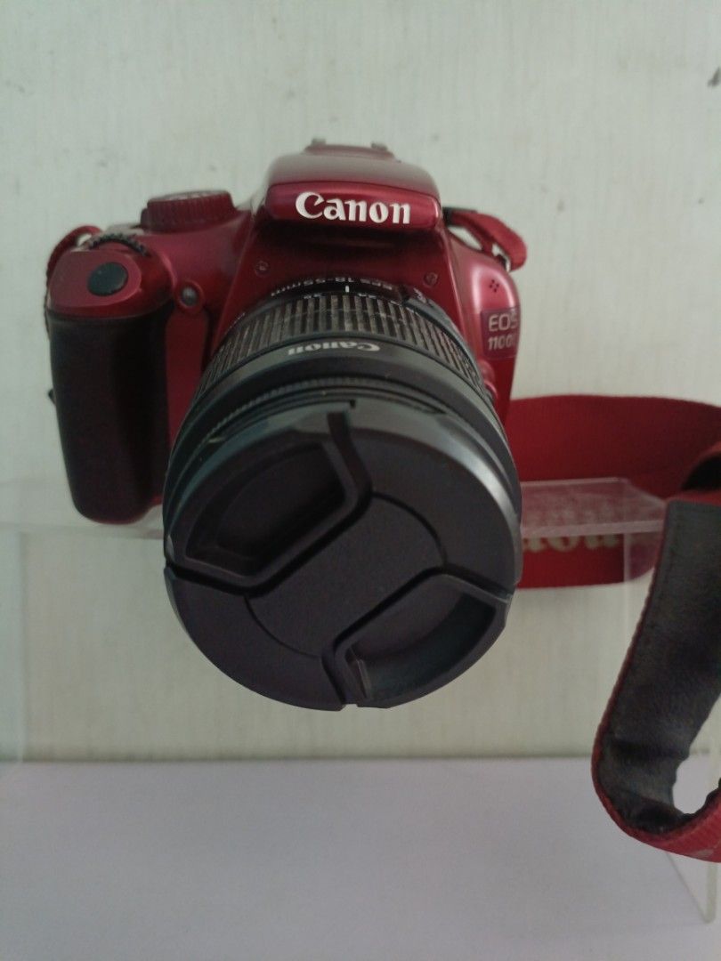 Canon EOS 1100D Red DSLR Camera (Category: Cameras) located in Cainta. Submitted by earvin_182 (Listing ID 1466337816, Image 2). Description: ‎📸 FOR SALE: Canon EOS 1100D Red DSLR Camera ‎ ‎💰 Price: ₱7,500 ‎ ‎Selling my 2nd-hand Canon EOS 1100D Red DSLR Camera. ‎ ‎📦 Inclusions: ‎ ‎Canon EOS 1100D DSLR Camera ‎ ‎Canon 18-55mm Lens ‎ ‎Lens Cap ‎ ‎Battery ‎ ‎Charger ‎ ‎Camera Bag ‎ ‎⚠️ CONDITION / ISSUE: ‎ ‎2nd-hand unit ‎ ‎USB port cover is torn