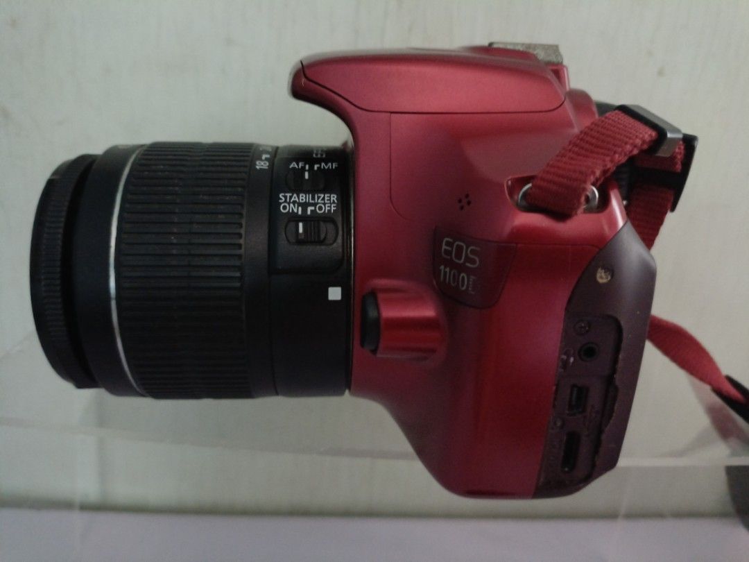 Canon EOS 1100D Red DSLR Camera (Category: Cameras) located in Cainta. Submitted by earvin_182 (Listing ID 1466337816, Image 3). Description: ‎📸 FOR SALE: Canon EOS 1100D Red DSLR Camera ‎ ‎💰 Price: ₱7,500 ‎ ‎Selling my 2nd-hand Canon EOS 1100D Red DSLR Camera. ‎ ‎📦 Inclusions: ‎ ‎Canon EOS 1100D DSLR Camera ‎ ‎Canon 18-55mm Lens ‎ ‎Lens Cap ‎ ‎Battery ‎ ‎Charger ‎ ‎Camera Bag ‎ ‎⚠️ CONDITION / ISSUE: ‎ ‎2nd-hand unit ‎ ‎USB port cover is torn