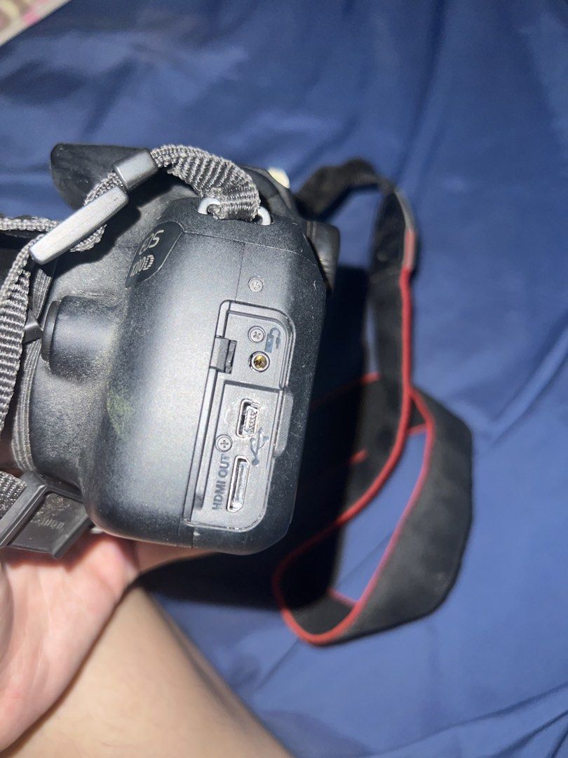 Canon EOS 1200D DSLR Camera (Category: Cameras) located in Paranaque City. Submitted by jaegermisis (Listing ID 1466508902, Image 3). Description: * Comes with original strap * Screen displays settings such as ISO, aperture, and shutter speed * RFS: Not using anymore INCLUSIONS: * Canon EOS 1200D body * Canon lens + cover * Camera bag * Battery + charger CONDITION / DISCLOSURE: * Strap shows normal wear from use * Noticeable crack on the bottom l