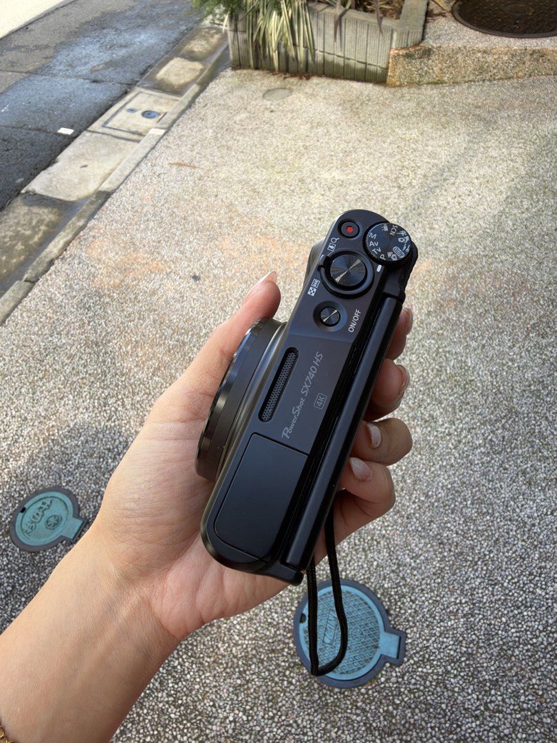 Canon PowerShot SX740 HS 40X Optical Zoom Camera (Category: Cameras) located in Cebu City. Submitted by christyyynnn (Listing ID 1466394896, Image 3). Description: - Model: Canon PowerShot SX740 HS (Black) - Zoom: Powerful 40x optical zoom - Video: 4K video recording capability - Display: Flip-up screen perfect for vlogging and selfies - Connectivity: Built-in Wi-Fi for quick phone transfers - Inclusions: Attached wrist strap - Condition: Clean b