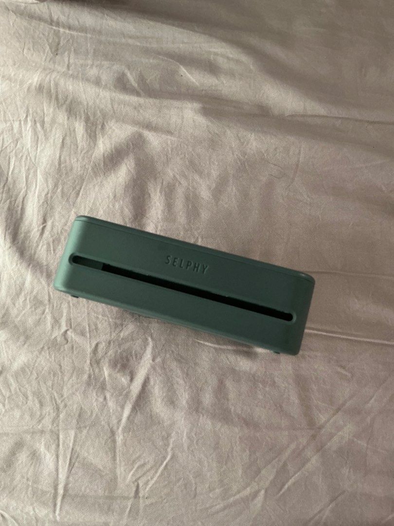 Canon Selphy QX20 Compact Photo Printer Dark Gray (Category: Printers, Scanners & Copiers) located in Quezon City. Submitted by chinchiminni (Listing ID 1466563145, Image 3). Description: - Model: Canon Selphy QX20 compact photo printer in sleek dark gray - Connectivity: Print straight from your phone or mobile device instantly - Charging: Convenient USB-C port with easy-access power button and status lights - Photo Format: Fast printing for high