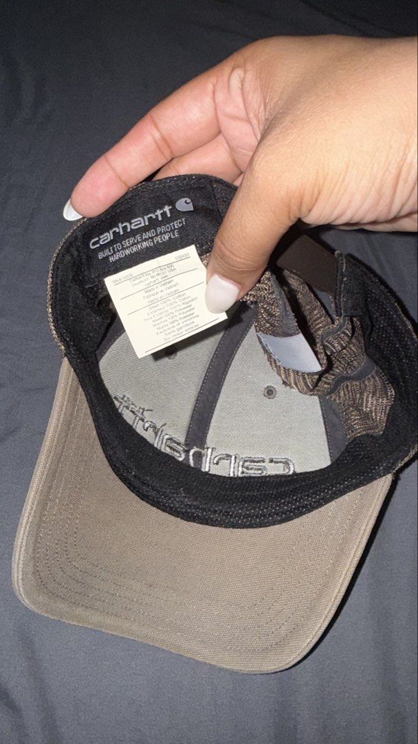 Carhartt Trucker Cap Brown Tan Mesh Snapback (Category: Caps & Hats) located in Andop. Submitted by nobleangel (Listing ID 1466501826, Image 3). Description: - Brand: Carhartt - Color: Tan and Brown - Condition: Excellent, interior sweatband and tags intact - Design: Structured cotton front with embroidered logo - Comfort: Breathable mesh back with adjustable plastic snap closure - Style: Classic workwear, perfect for everyday wear.