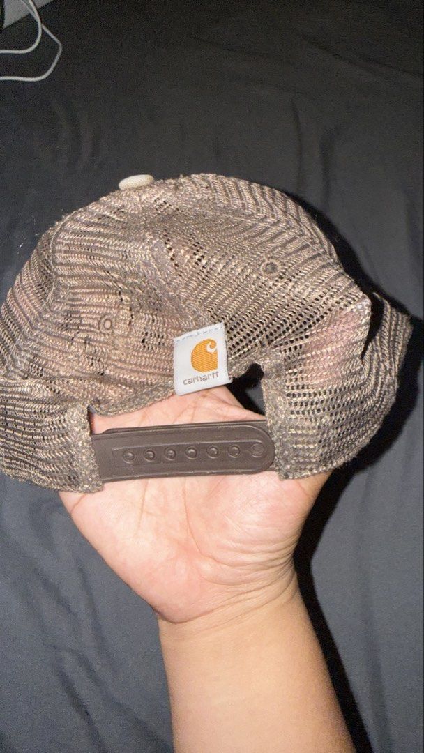 Carhartt Trucker Cap Brown Tan Mesh Snapback (Category: Caps & Hats) located in Andop. Submitted by nobleangel (Listing ID 1466501826, Image 2). Description: - Brand: Carhartt - Color: Tan and Brown - Condition: Excellent, interior sweatband and tags intact - Design: Structured cotton front with embroidered logo - Comfort: Breathable mesh back with adjustable plastic snap closure - Style: Classic workwear, perfect for everyday wear.