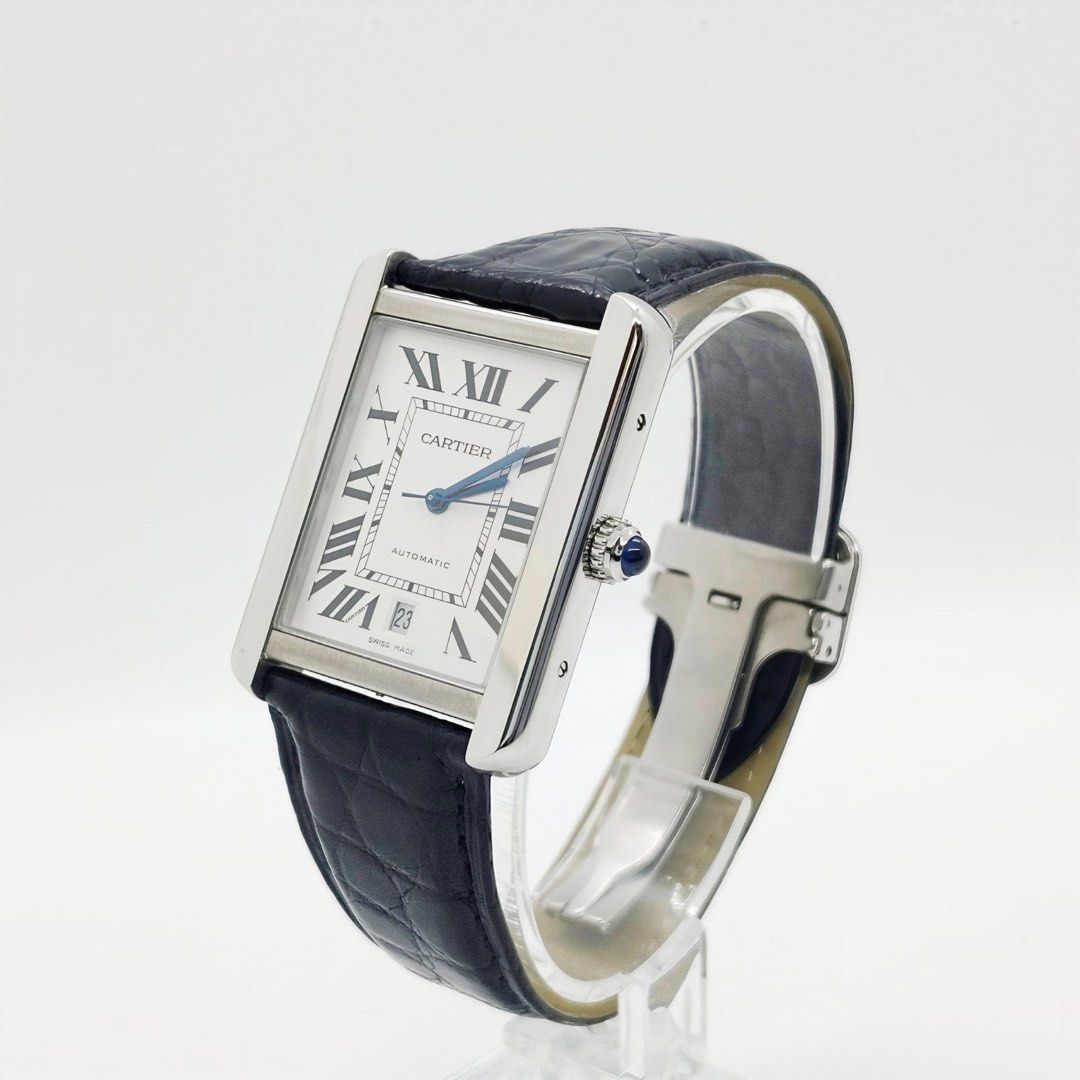 Cartier Tank Solo XL Automatic (Category: Luxury Watches) located in Makati City. Submitted by the_ambitious_peasant (Listing ID 1466383624, Image 1). Description: - Model: Cartier Tank Solo - Material: Stainless Steel - Movement: Automatic with date at 6 o'clock - Dial: White with black Roman numerals and blued steel hands - Crown: Set with a blue spinel cabochon - Strap: Original black alligator leather strap with signed deployant buckle - Cond