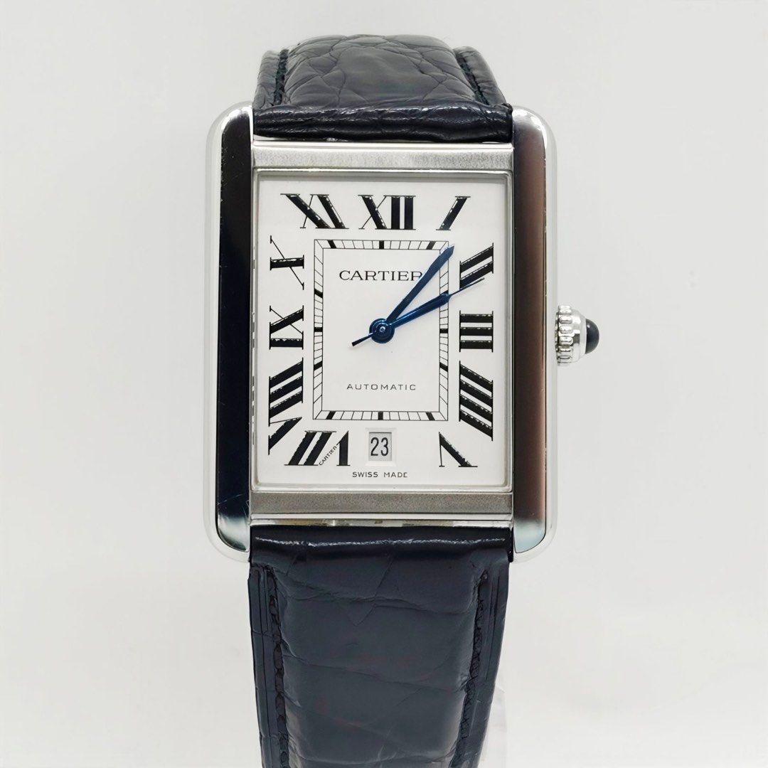 Cartier Tank Solo XL Automatic (Category: Luxury Watches) located in Makati City. Submitted by the_ambitious_peasant (Listing ID 1466383624, Image 2). Description: - Model: Cartier Tank Solo - Material: Stainless Steel - Movement: Automatic with date at 6 o'clock - Dial: White with black Roman numerals and blued steel hands - Crown: Set with a blue spinel cabochon - Strap: Original black alligator leather strap with signed deployant buckle - Cond