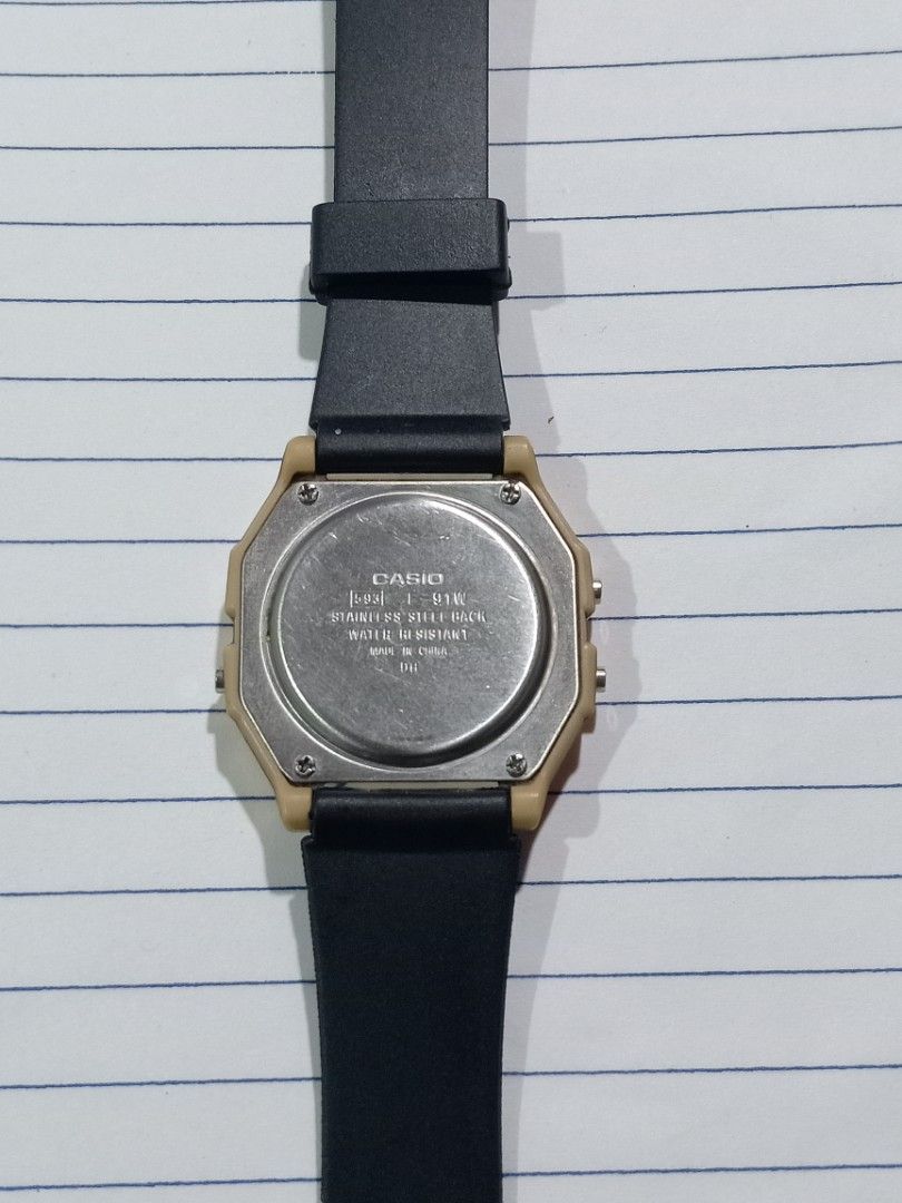 Casio F-91WM-9A Digital Watch (Category: Women's Watches) located in Calamba. Submitted by thekidwholovesvintage (Listing ID 1466372579, Image 2). Description: - Model: Casio F-91WM-9A (Retro Digital Watch) - Design: Gold-tone resin case with a comfortable black resin strap - Functions: Alarm, chronograph (stopwatch), and water resistance - Build: Stainless steel back case, lightweight everyday wear - Movement: Battery-powered quartz, runs smooth