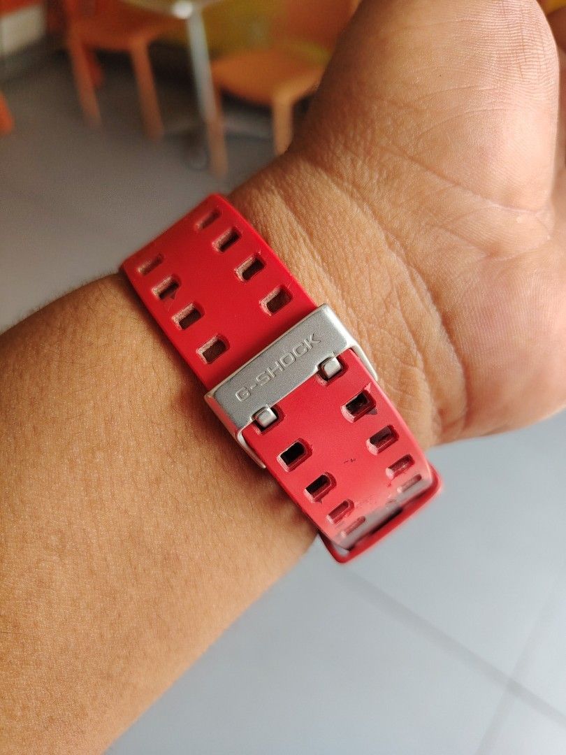 Casio G-Shock Red Camouflage Digital Watch (Category: Men's Watches) located in Las Pinas. Submitted by mitchellestrada20202020 (Listing ID 1466561253, Image 3). Description: - Brand: Casio G-Shock - Design: Bold red and dark red camo pattern - Display: Digital showing day, date, and time - Key Features: World Time, Illuminator, and 20bar Water Resist - Build: Heavy-duty chunky resin with a secure metal buckle - Style: Tactical timepiece, perfect