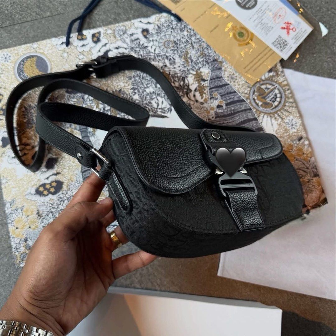 CD Mini Sadle Bag (Category: Sling Bags) located in Manila. Submitted by hatline_co. (Listing ID 1466350536, Image 3). Description: CD Mini Sadle bag Leather/M0n0gram Sling bag Buckle Pin Adjustable strap Comes with Dustbag & Box SALE!! .