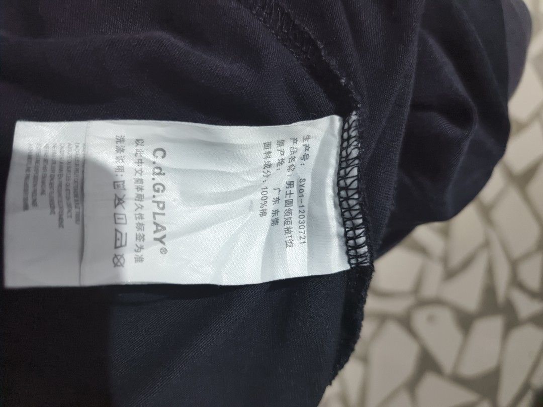 Cdg play shirt (Category: Activewear) located in Manila. Submitted by coolbird.e6a52c (Listing ID 1466523872, Image 3). Description: good condition walang crack sa print, no pinhole.
