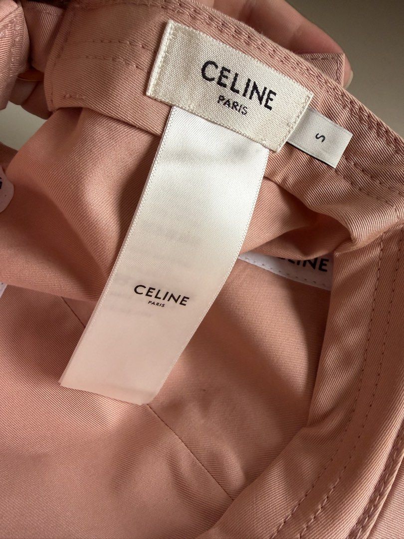 Celine Triomphe Baseball Cap in Cotton Pink Size S (Category: Caps & Hats) located in Makati City. Submitted by lovedbyalexis_ (Listing ID 1466376536, Image 3). Description: - 100% Authentic Celine baseball cap - Color: Soft pink cotton twill with off-white embroidered Triomphe logo - Size: S - Style: Classic 6-panel construction with curved brim - Condition: Excellent, comes with internal brand tags - Perfect for elevating your casual daily fits