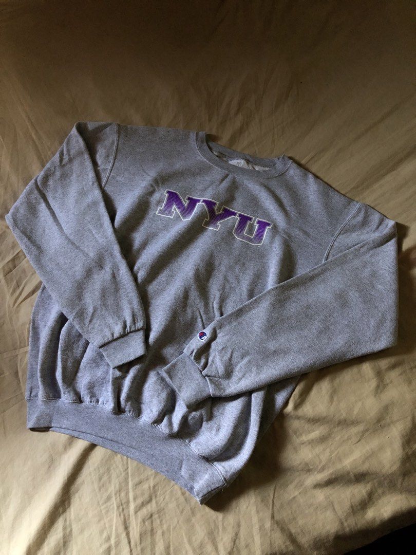 Champion NYU sweater (Category: Coats, Jackets and Outerwear) located in Muntinlupa City. Submitted by josh_fitsnfinds (Listing ID 1466407132, Image 1). Description: good condition..
